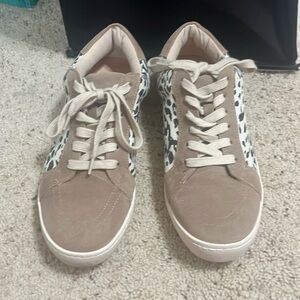 Women’s tan and cheetah sneakers